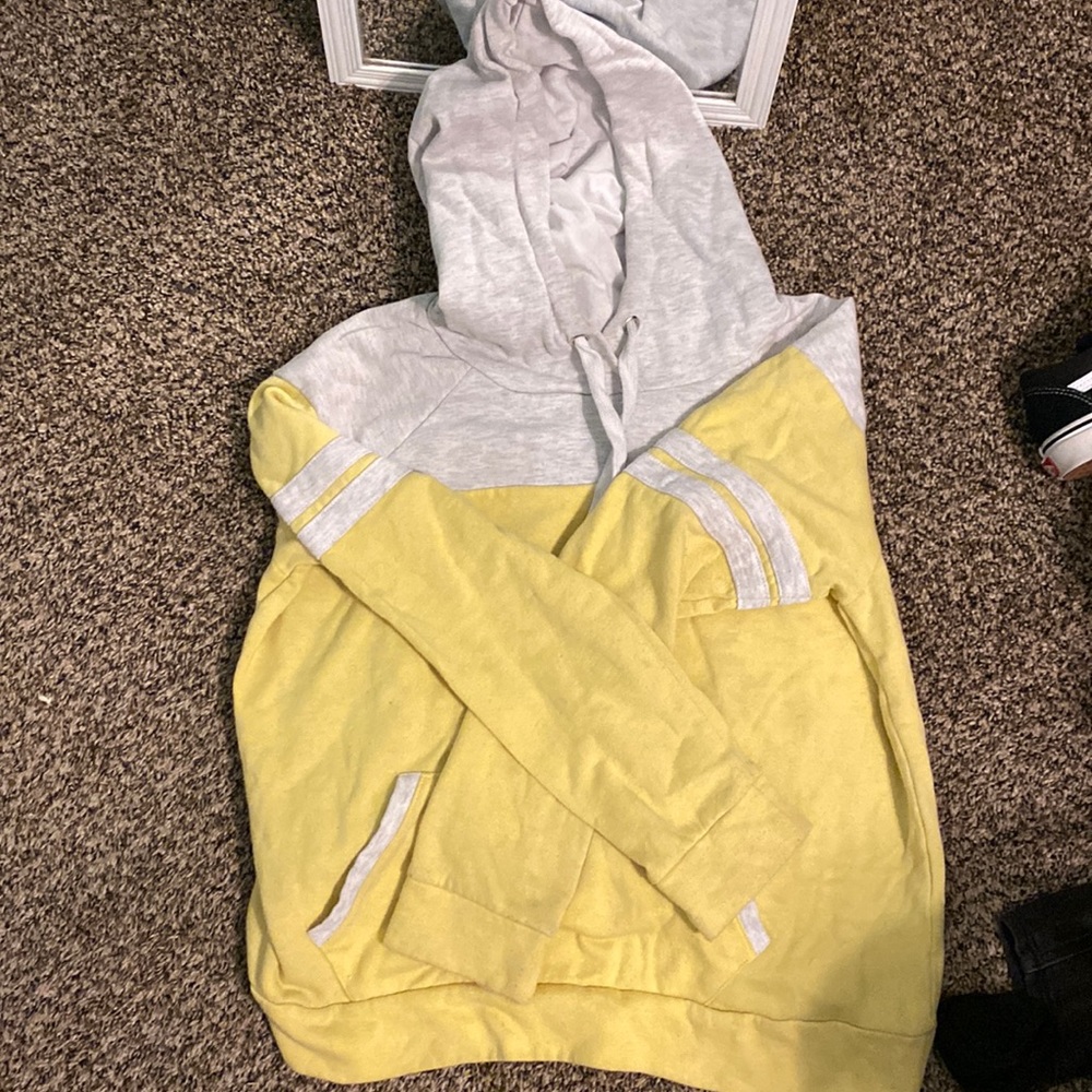A yellow and gray hoodie
